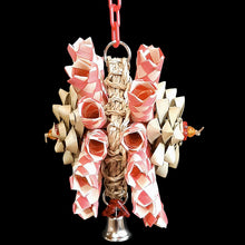 Load image into Gallery viewer, A double sided shredding toy made with bamboo shredders and palm leaf bows on a mini seagrass mat. Hangs on plastic chain with a nickel plated bell and charms on the bottom. Designed for small to intermediate sized birds. Available in assorted colors.  Measures approx 6&quot; by 10&quot; including chain and link.
