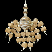 Load image into Gallery viewer, Two dozen corks with little wood snap beads dangling from a sola rope ball center with natural wood beads and shapes. Designed for small to intermediate sized birds.  Measures approx 7&quot; by 12&quot; including link.
